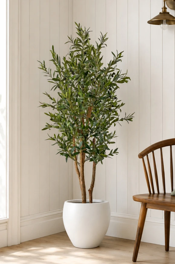 Artificial olive tree placed in a hallway setting