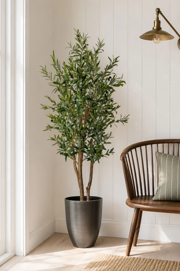 Artificial olive tree placed in a kitchen corner