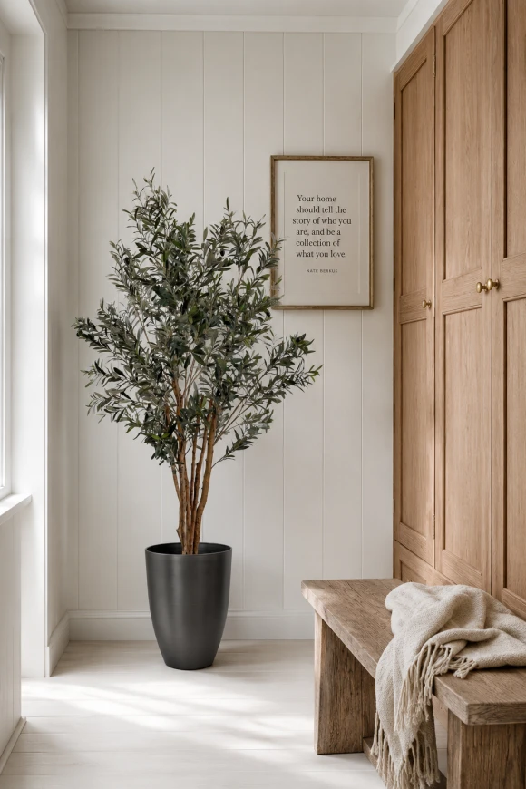 Artificial olive tree installed in a hallway