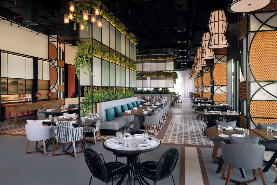 plants in fibreglass planters built into a restaurant wall